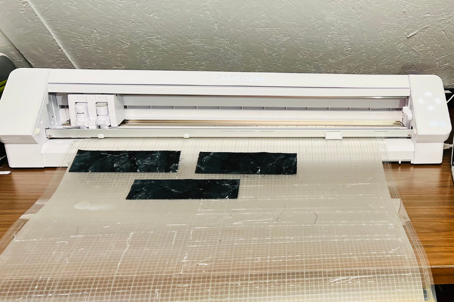 Fabric is cut using the Silhouette Cameo 4.