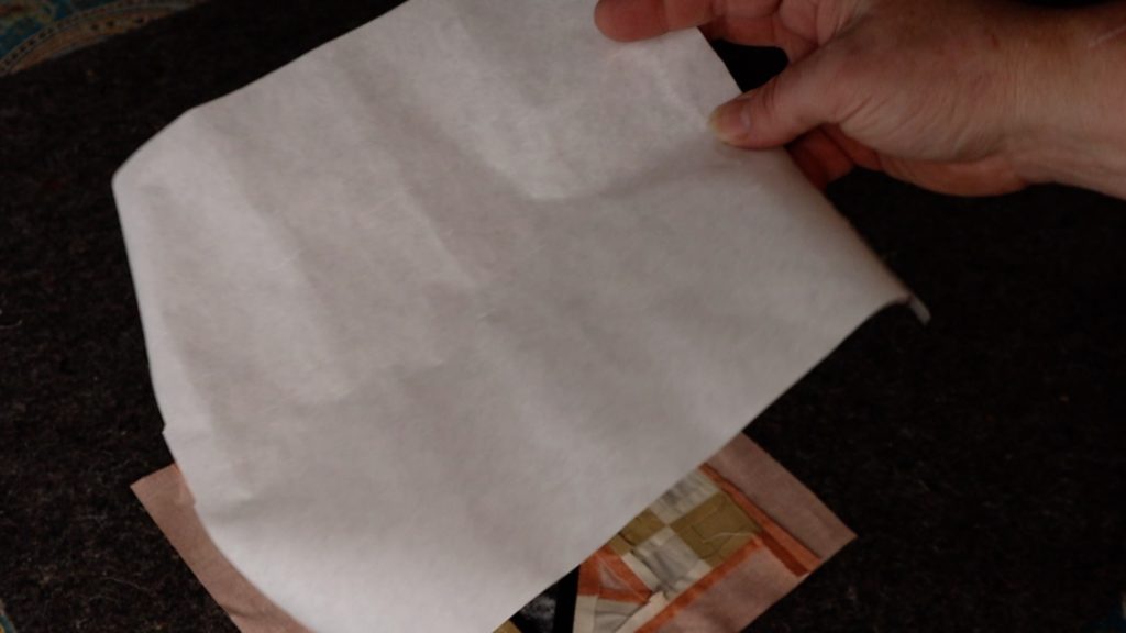 Interfacing applied to the back of the quilt block for added stability.