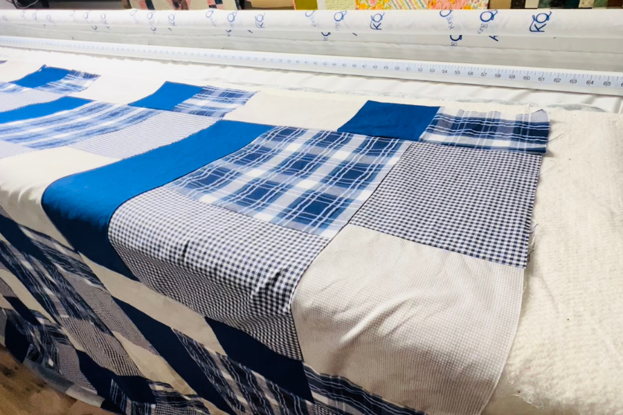 Floating the king-sized quilt to the longarm frame